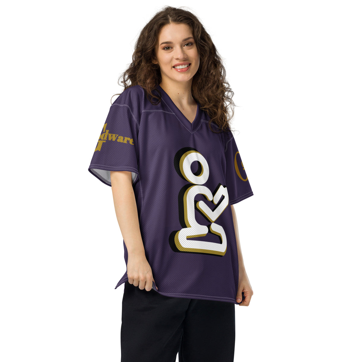 Christian football jersey in purple featuring a praying figure and GodWare logo on the sleeve.