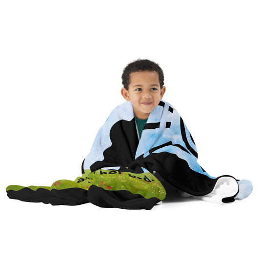 Child wrapped in Just a Girl velvety soft throw blanket with colorful design, perfect for cozy evenings.