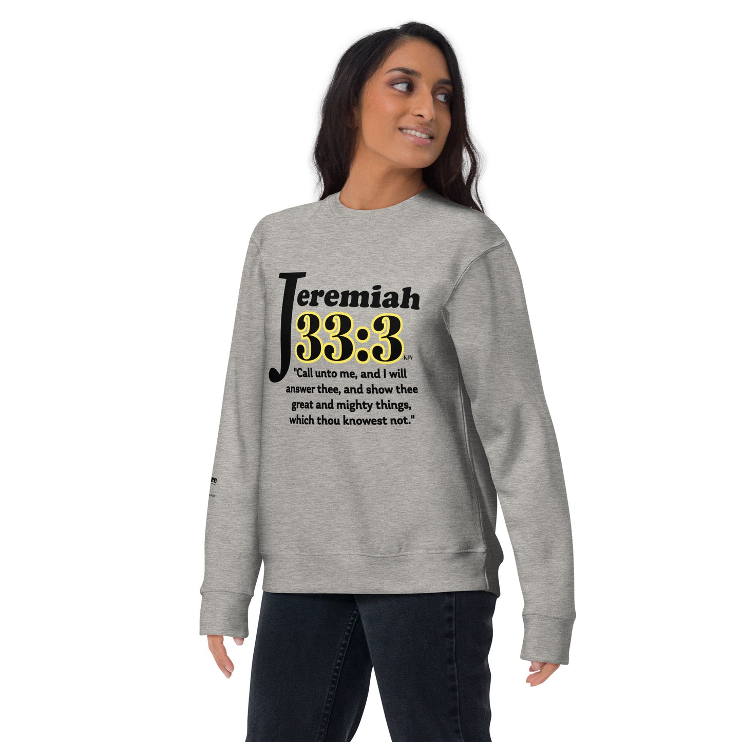 woman with grey sweatshirt; scripture on shirt