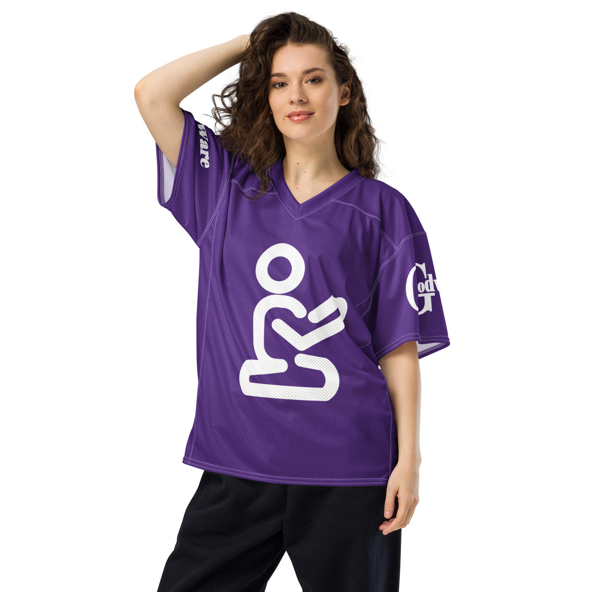 Christian football jersey in purple worn by a woman, showcasing breathable mesh design and loose fit.