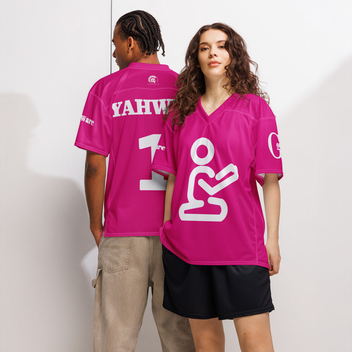 Yahweh Christian Football Jersey in bright pink and white worn by models, featuring large prayer graphic and number 1.