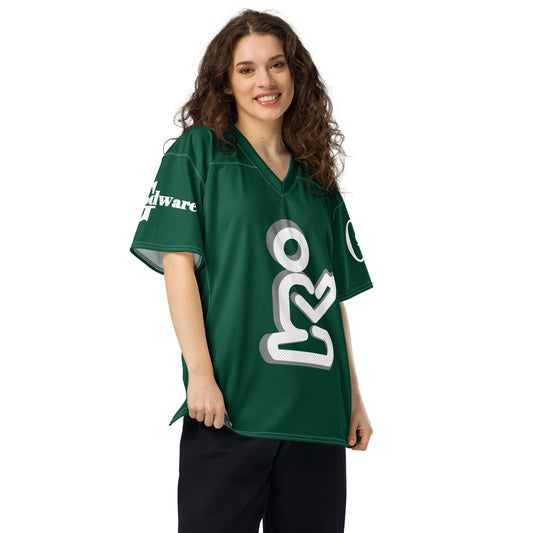 Christian woman wearing a green Yahweh football jersey with a praying figure design and GodWare branding.
