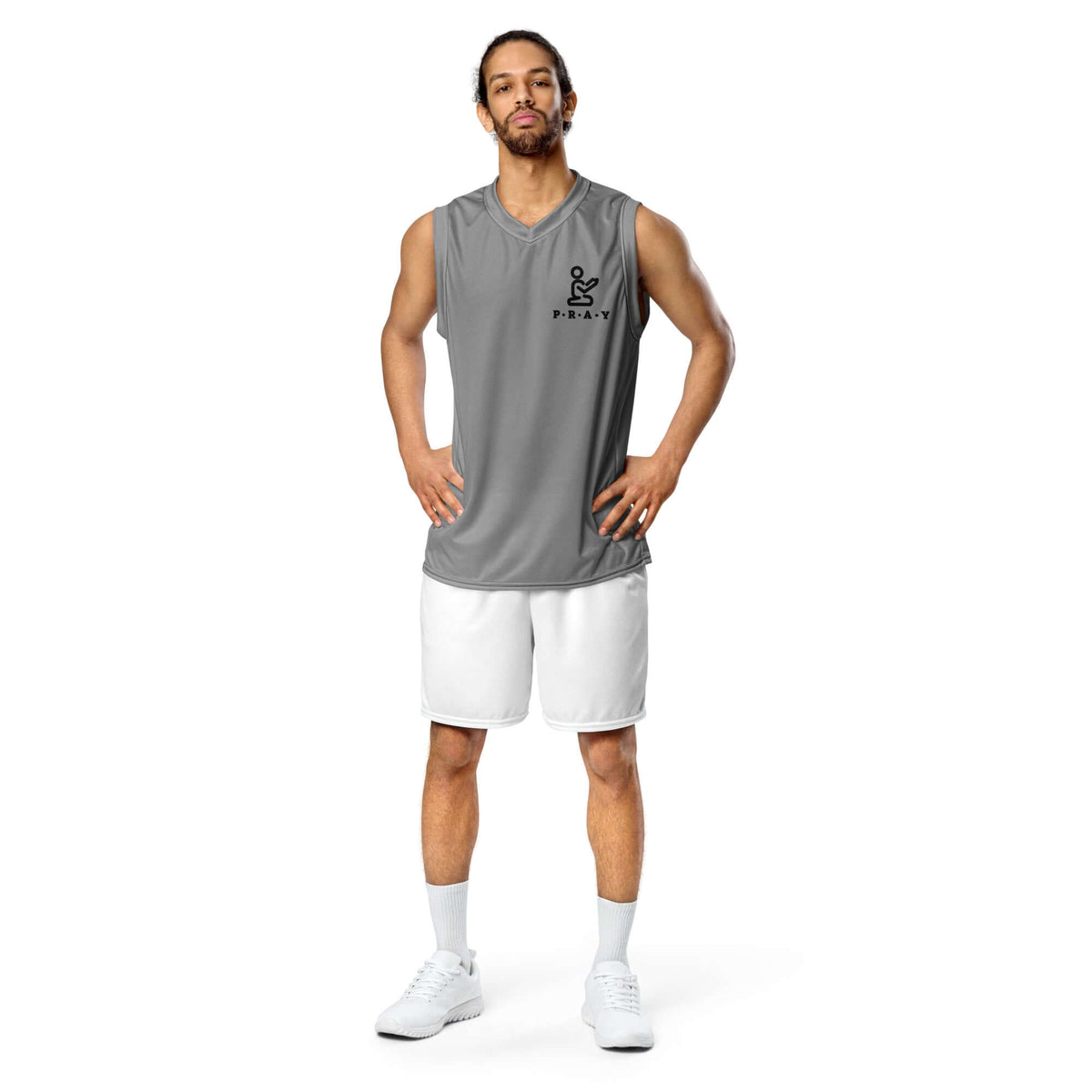 A man wearing a grey Pray Christian Grey Recycled Mesh Basketball Jersey with shorts, showcasing sporty style and comfort.