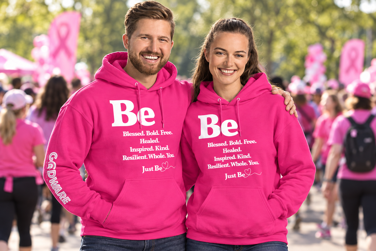 Couple wearing heliconia hoodies at a breast cancer awareness event