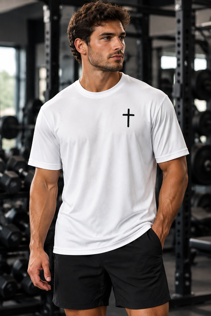Male model wearing the white performance tee in a gym