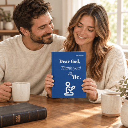 Man and woman with the blue Dear God journal in a sunlit lifestyle setting