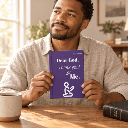 Man holding the purple Dear God journal in a sunlit lifestyle setting
