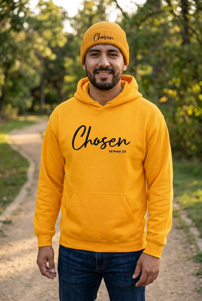 Man wearing the matching gold Chosen hoodie and embroidered beanie outdoors